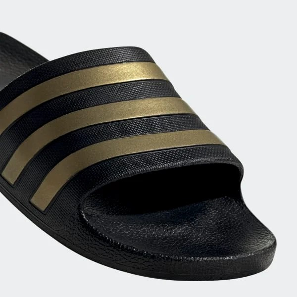 CLAQUETTES CONFORT ADILETTE – ADIDAS – EG1758 – NOIR/GOLD